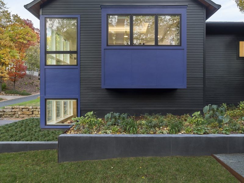 Closer view of side of house showing cantilevered nook that extends from exterior wall